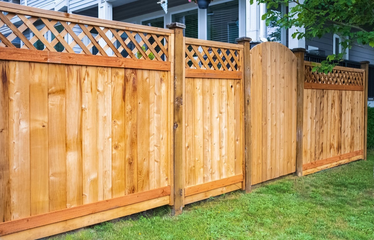 Wooden fence around house property
